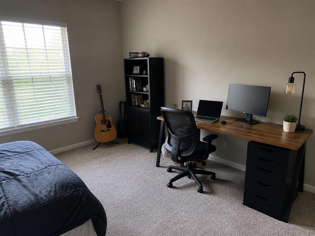 Example photo of a home office with desk, computer and guitar documented in MemoSafe